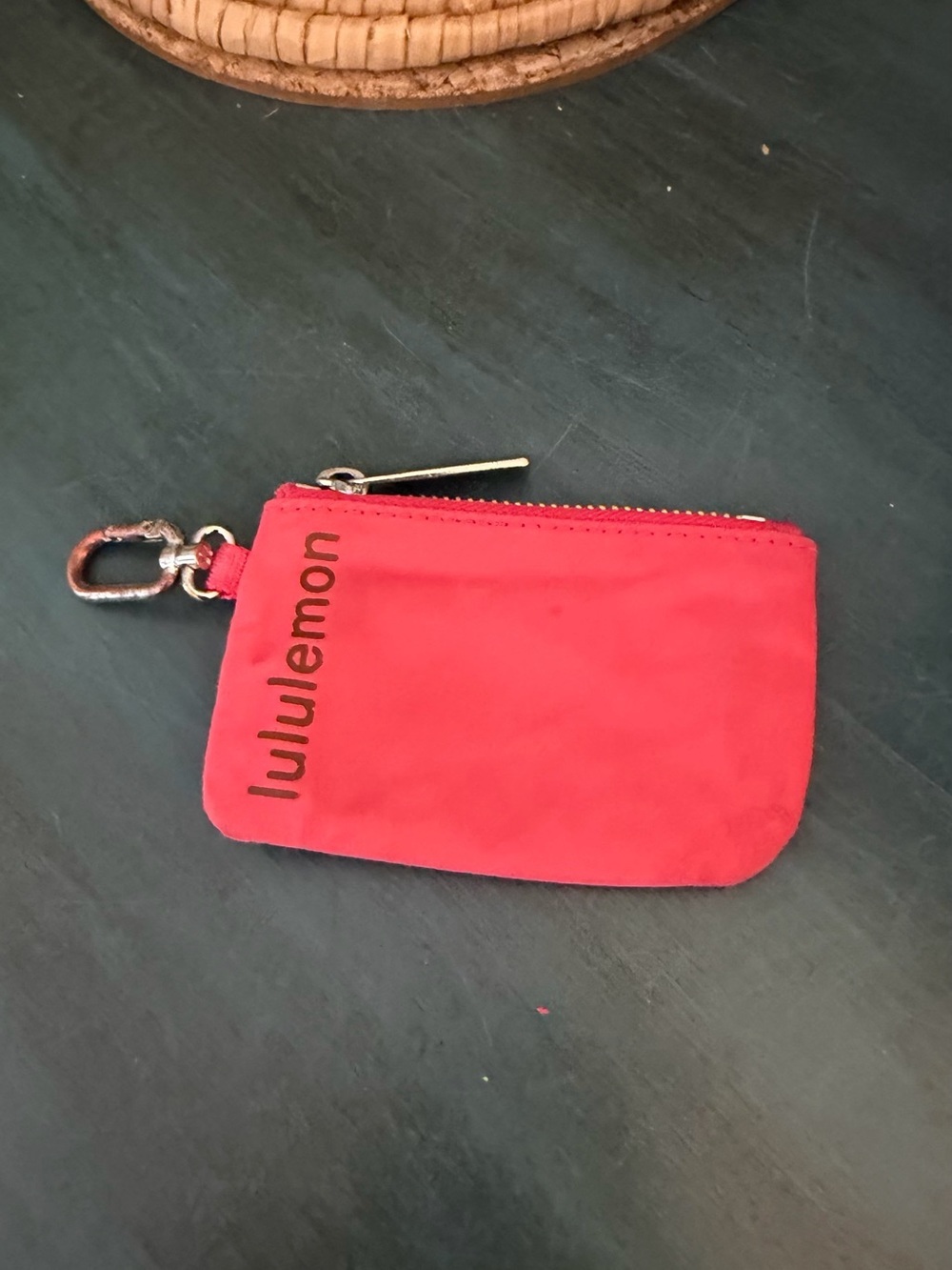 Lululemon clippable card pouch zipper. Deep salmon color.